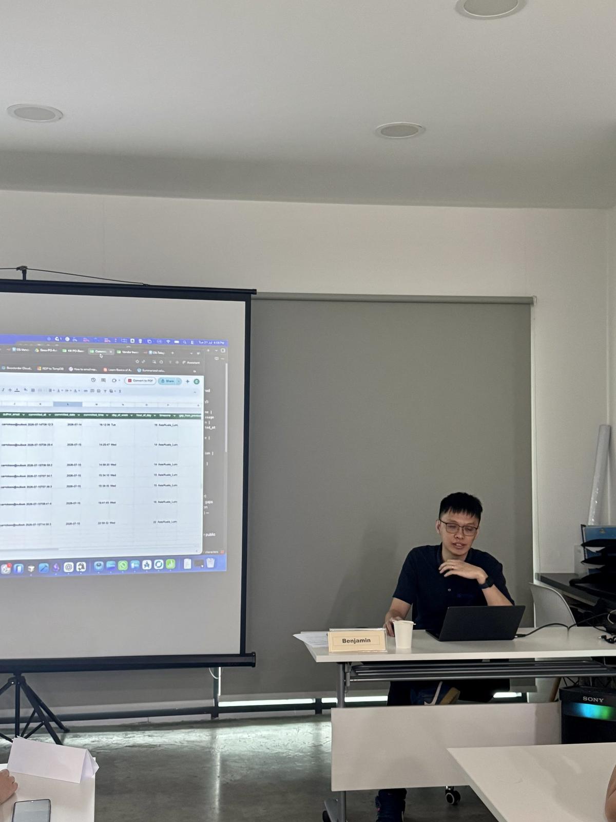 Participants presenting the automation they built during training