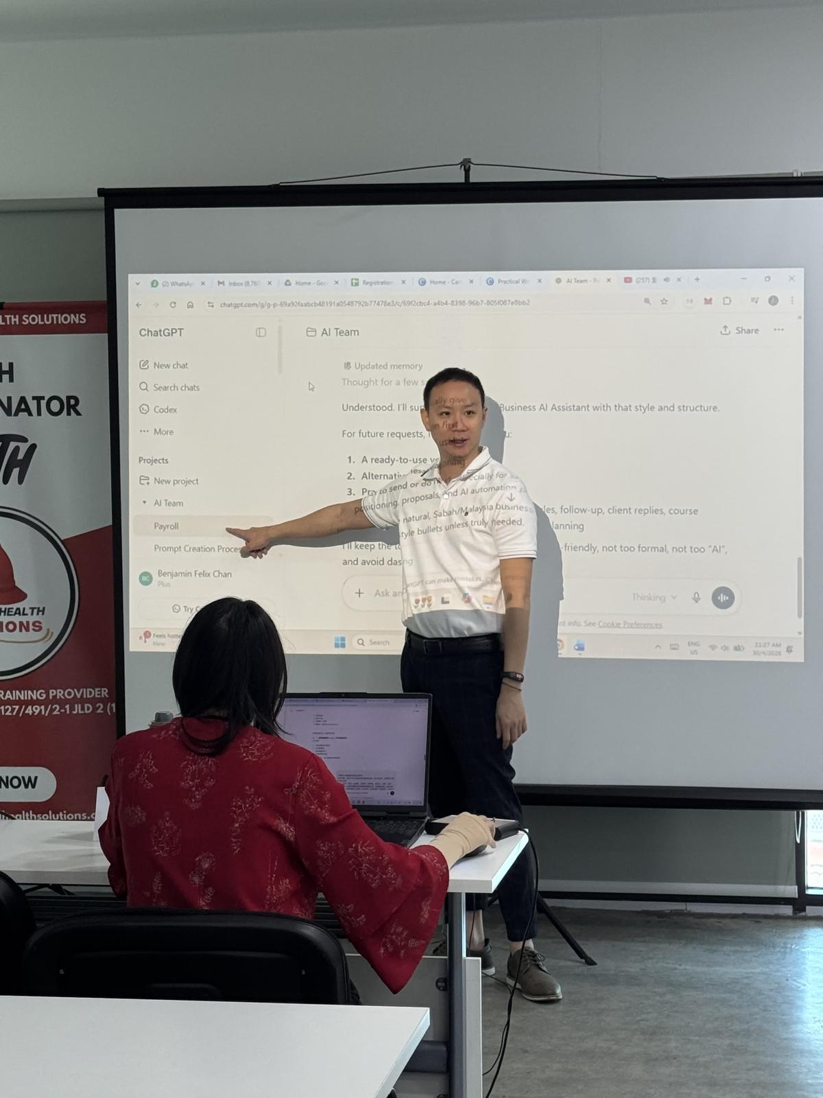 Trainer demonstrating an AI assistant during an earlier TMA practical AI programme