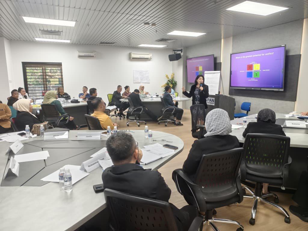 An interactive public sector training session in Sabah